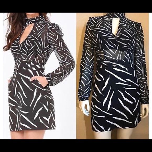 bebe Dresses & Skirts - Bebe printed black and white dress